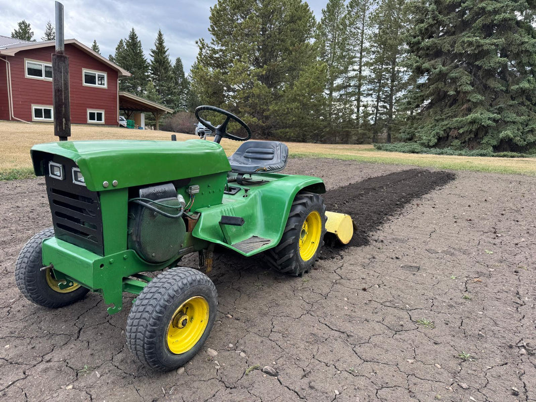 John Deere 110 with rotortiller