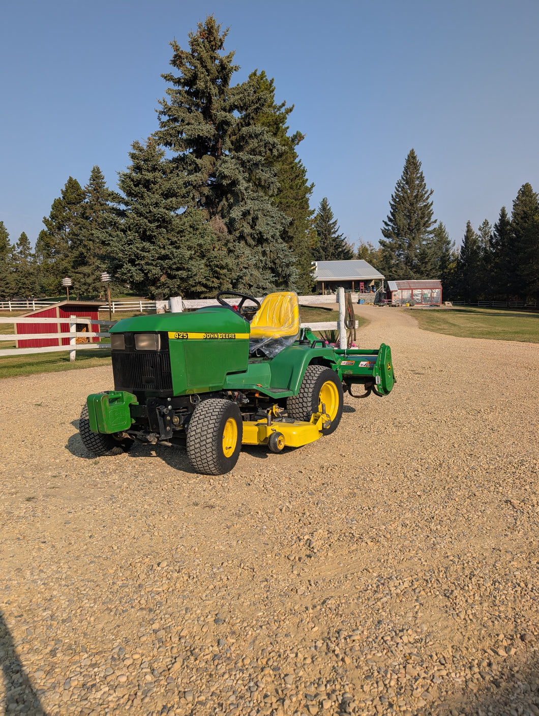 John Deere 425 with 647 JD tiller and 54