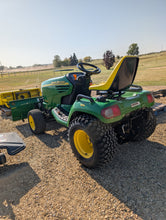 Load image into Gallery viewer, John Deere X585 4x4 with front blade and 54&quot; mowing deck
