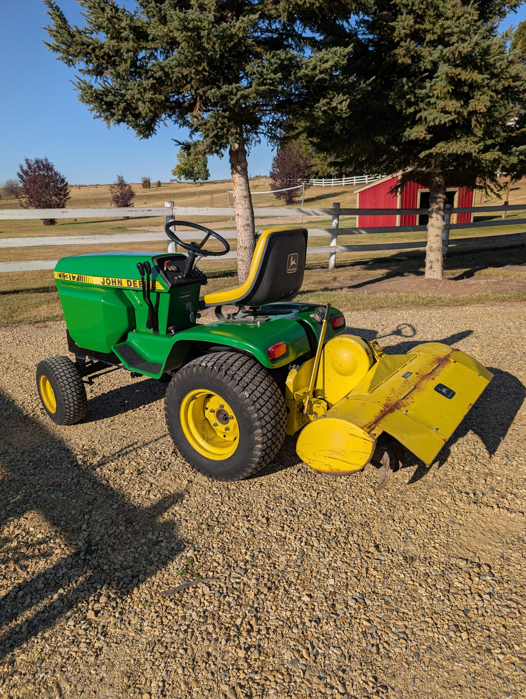 John Deere 317 with rototiller