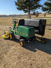 Load image into Gallery viewer, John Deere F725 with 48&quot; mowing deck and bagger system
