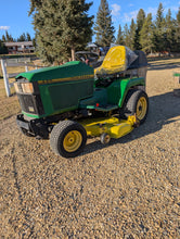Load image into Gallery viewer, John Deere 425 with 54&quot; mowing deck and bagger system

