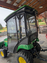Load image into Gallery viewer, John Deere 2305 Heated Cab with Stereo setup.
