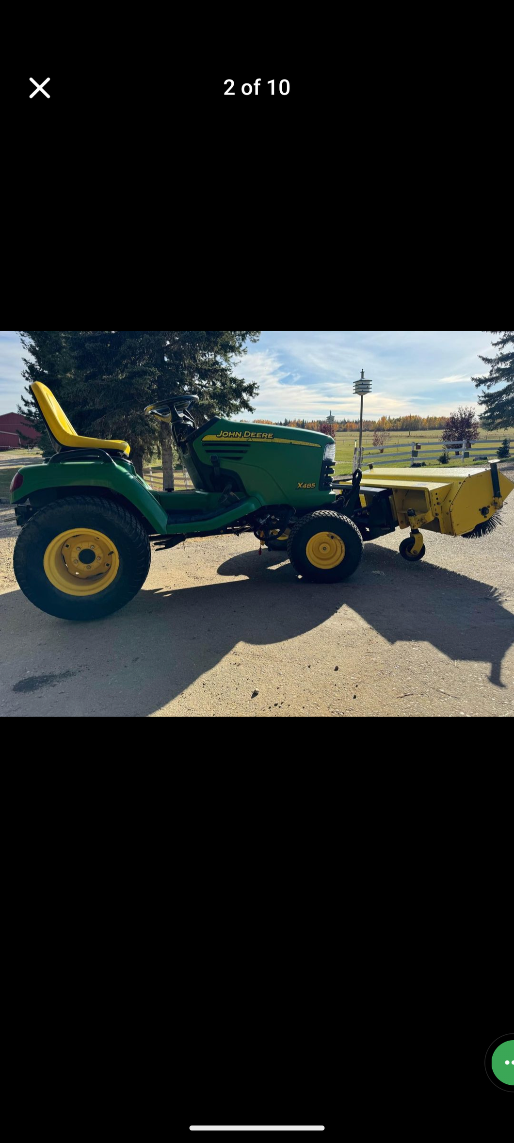 John Deere X485 tractor broom snowplow