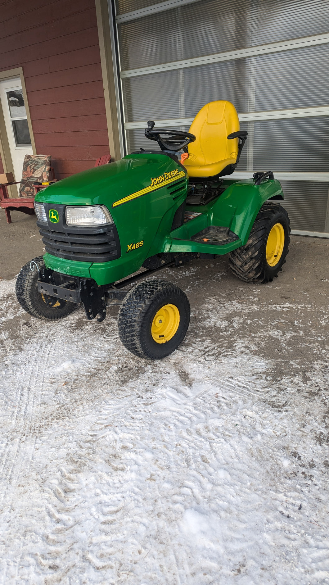 John Deere X485 tractor rototiller