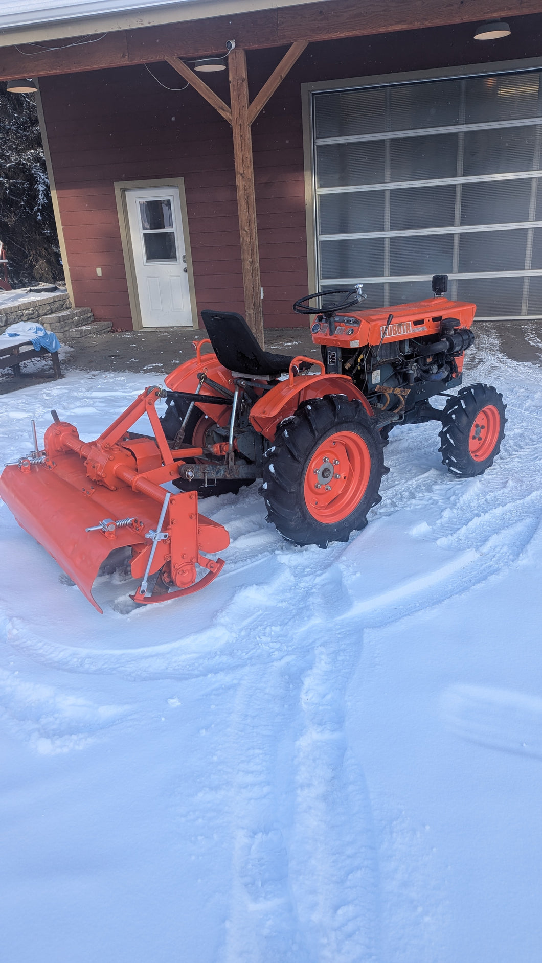 Kubota B7100 and rototiller