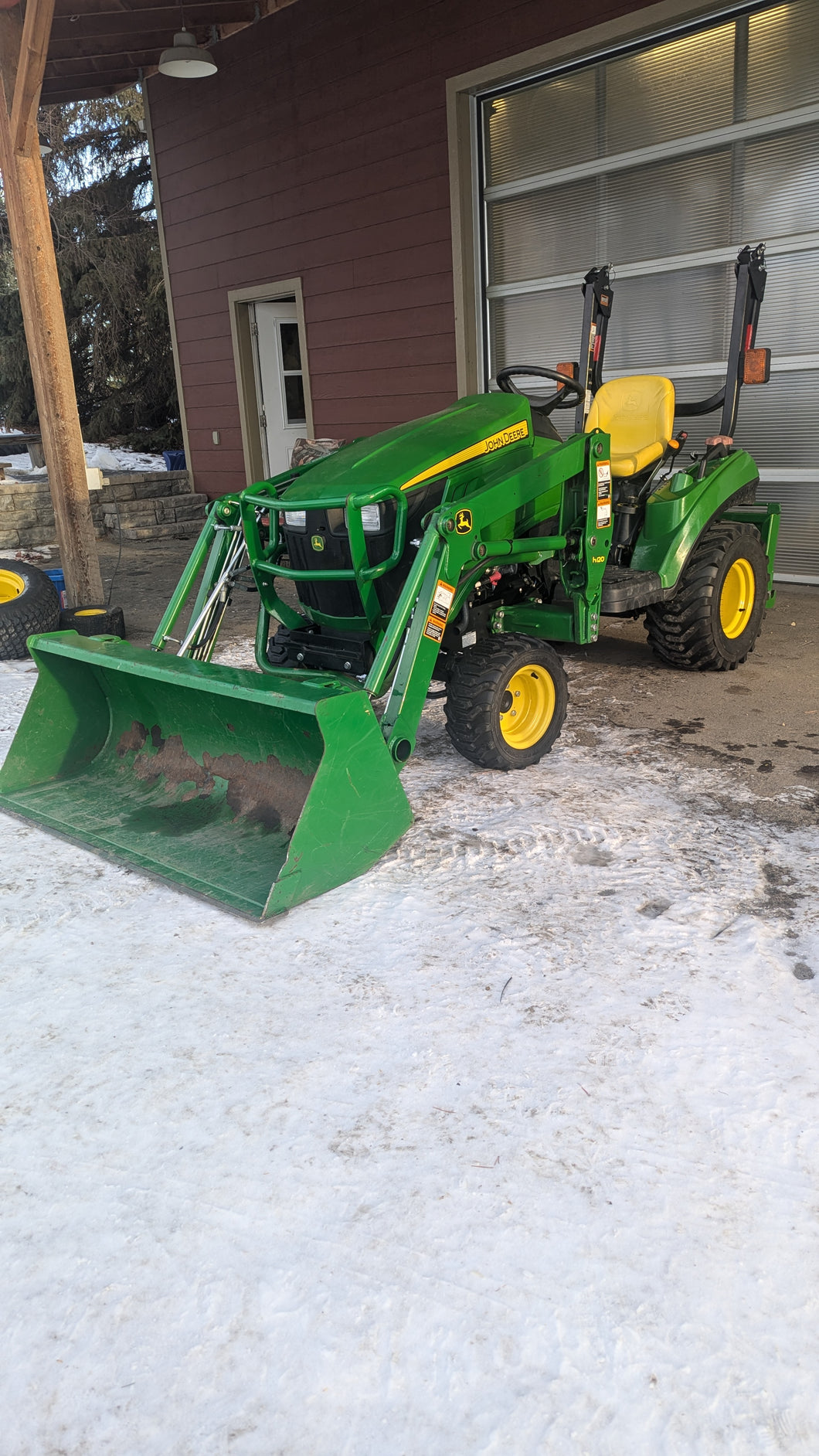 John Deere 1023E diesel compact tractor loader